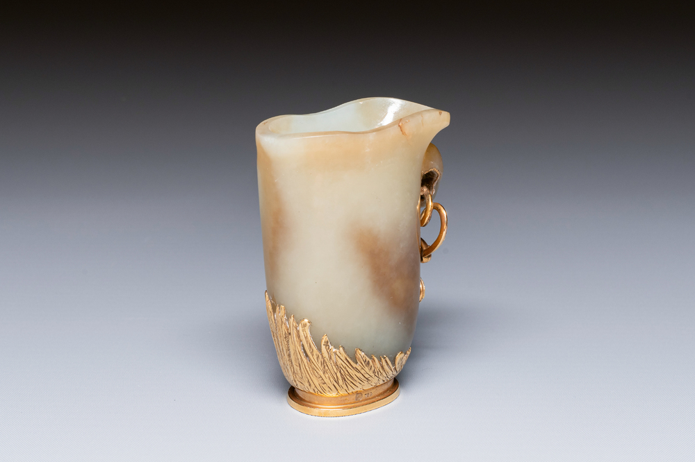 A Chinese jade rhyton with 18k gold mount, 19th C.