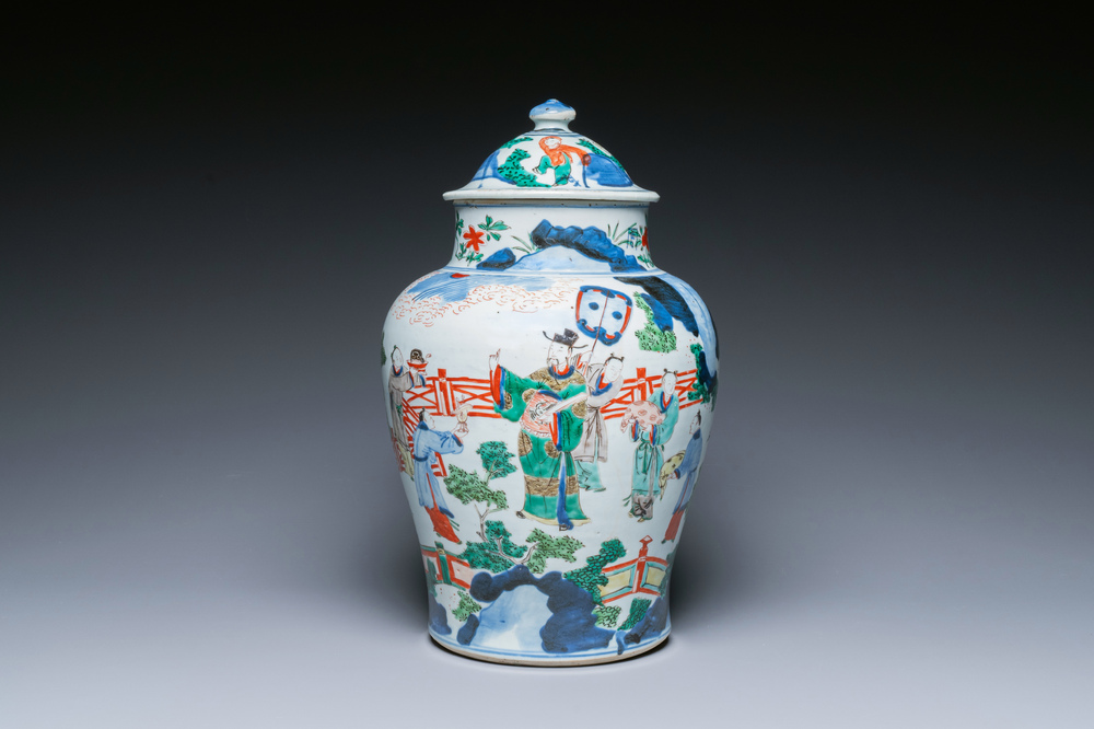 A Chinese wucai vase and cover with narrative design, Transitional period