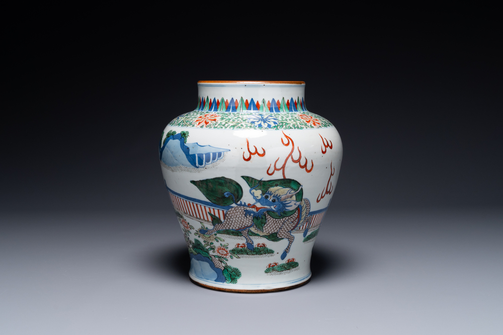 A Chinese wucai 'qilin' baluster vase, 19th C.