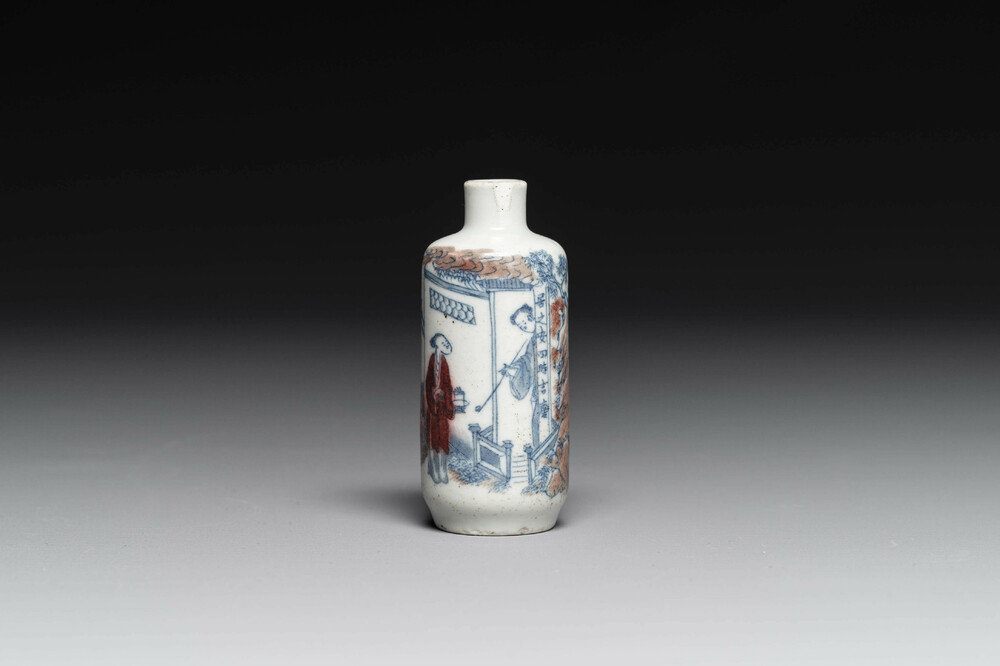 A Chinese blue, white and copper-red snuff bottle with inscription, 19th C.