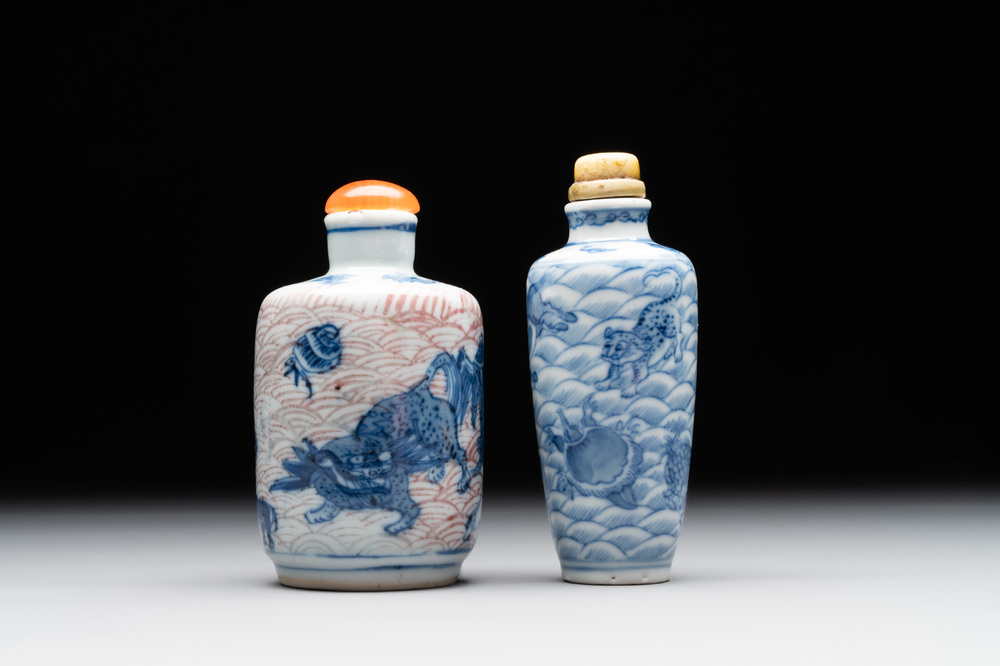 Two Chinese blue, white and copper-red 'mythical animals' snuff bottles, Qianlong mark and of the period