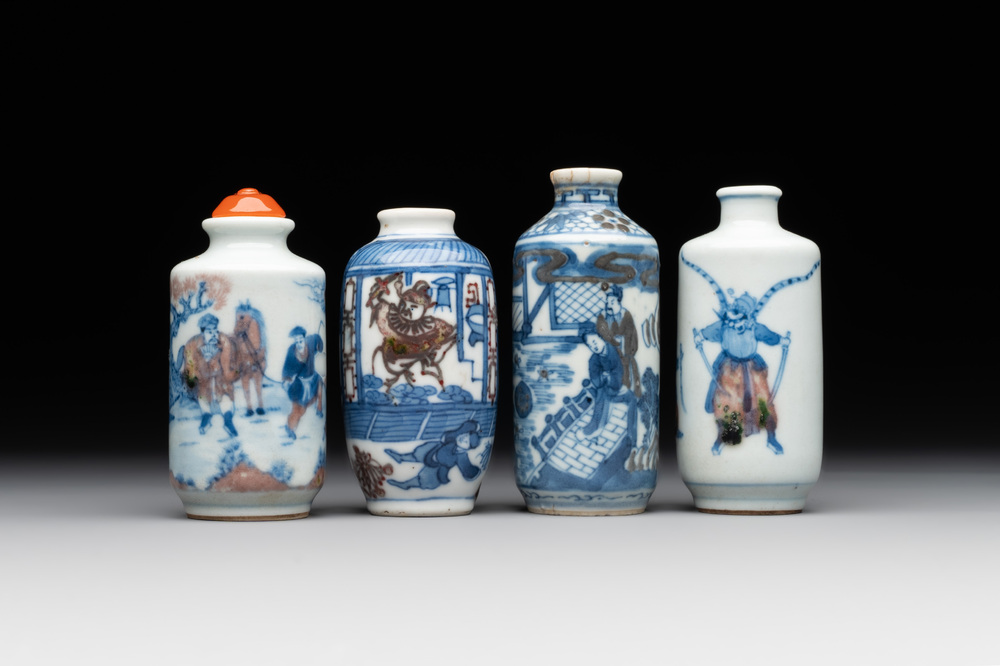 Four Chinese blue, white and copper-red snuff bottles, Yongzheng and Daoguang mark, 19th C.