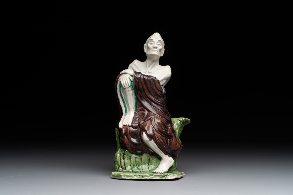 A fine Chinese sancai-glazed figure of a Luohan, Qianlong