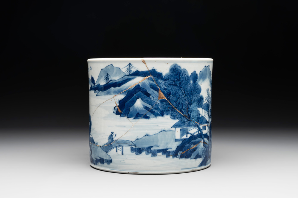 A Chinese blue and white 'landscape' brush pot, Kangxi