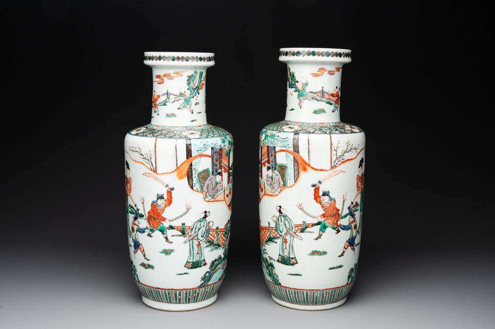 A pair of Chinese famille verte rouleau vases with narrative design, 19th C.