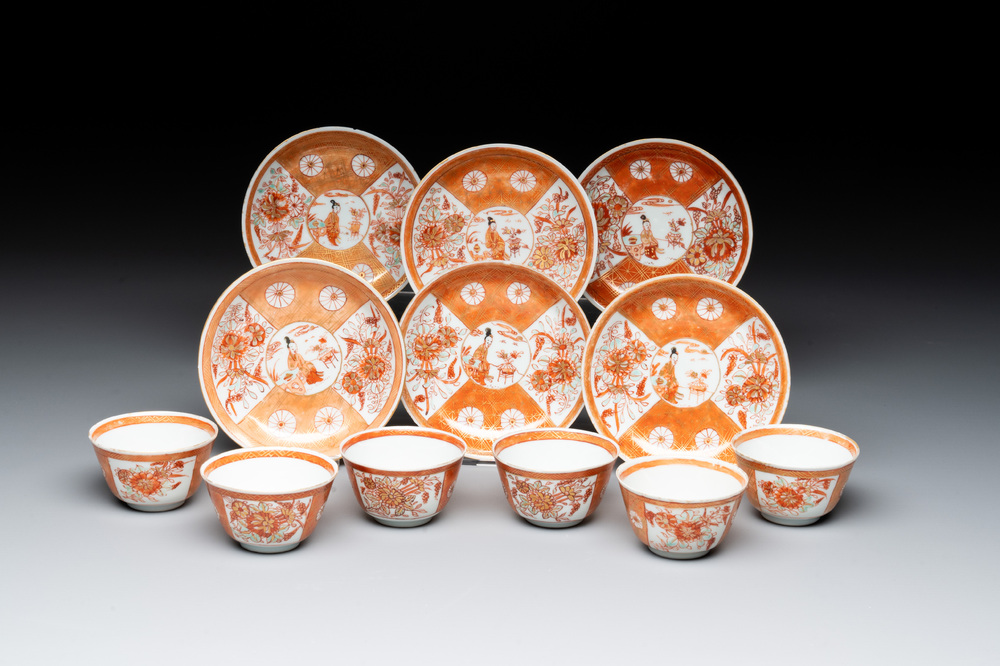 Six Chinese gilt-decorated iron-red cups and saucers with figural design, Yongzheng