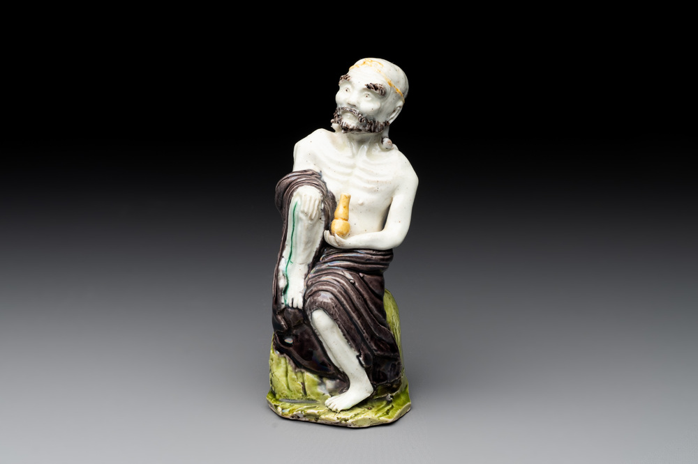 A Chinese sancai-glazed figure of a Luohan, Qianlong