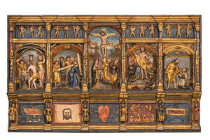 A large Flemish polychrome walnut retable, probably Ghent, dated 1529