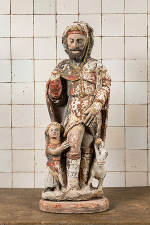 Un important groupe figurant Saint Roch au garçon et chien en pierre calcaire sculptée avec restes de polychromie, 17/18ème