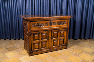 A Spanish wooden dresser with two doors and one drawer, 17th C.