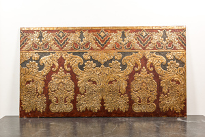 A Spanish rectangular panel of embossed gilt leather wallpaper, signed Meryan, Cordoba, 20th C.