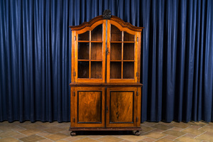 A colonial wooden display cabinet with four doors and two drawers at the inside, ca. 1800