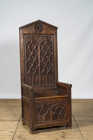 A large Gothic Revival walnut bishop chair or cathedra, 19th C.