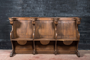 An impressive Flemish oak pew, 18th C.