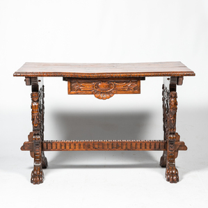 A renaissance-style walnut cheek table, 19th C.