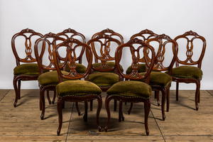 A set of ten French wooden chairs with green velvet upholstery, 19th C.