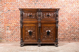 A Flemish ebonised and oak wooden four-door cabinet, 17th C.