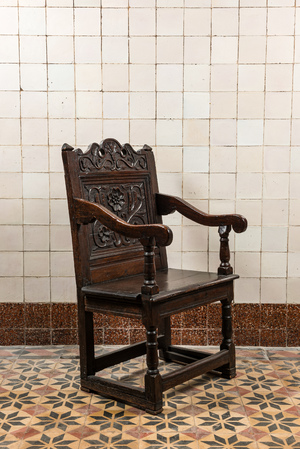 An English oak armchair, early 18th C.