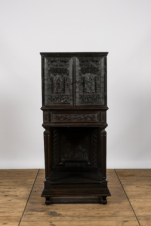 A neoclassical ebonised wooden cabinet on foot with an interior with parquetry and polychrome design, 18th C. and later