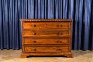 A walnut four-drawer commode, 19th C.