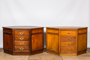 Two oak wooden counters with curved front, 1st half 20th C.