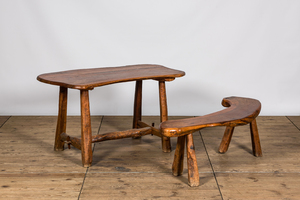 A rural hardwooden garden table with matching bench, 20th C.