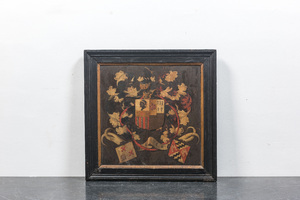 Een beschilderde houten paneel met wapenschild, gedat. 1650