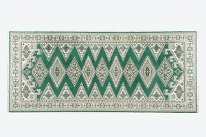 Un tapis oriental à décor de motifs géométriques, laine sur coton, 20ème