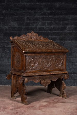 A walnut cassone or marriage chest on stand, probably Italy, 19th C. with older elements