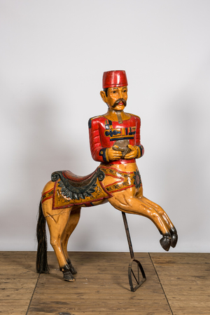 Un cheval de carrousel en bois à décor polychrome, 20ème