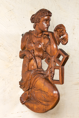 A twin-faced wood carving of the Greek muse Urania allegorically depicting geometry, Liège, 18/19th C.