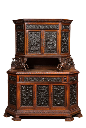 A carved oak buffet with stamped copper panels, 19/20th C.