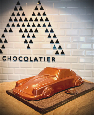 Chocolatier M: Een unieke XL selectie chocolade pralines en een Limited Edition Porsche